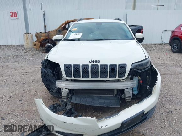 2019 Jeep Cherokee Latitude Plus with VIN 1C4PJLLBXKD405322, listed as a IAAI auction lot 41708104 with 93,295 mi miles and . Bid and sale history available at DreamBid. Image 12.