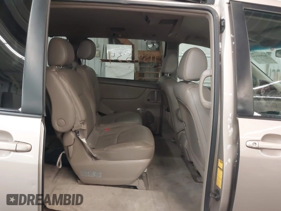 2005 Toyota Sienna XLE with VIN 5TDBA22C85S047371, listed as a IAAI auction lot 41591534 with 185,209 mi miles and . Bid and sale history available at DreamBid. Image 8.