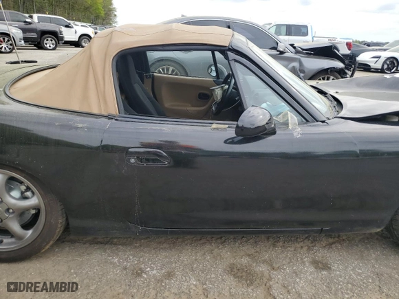 1999 Mazda MX-5 Miata with VIN JM1NB3539X0122676, listed as a Copart auction lot 51857265 with 0 mi miles and Clean Title. Bid and sale history available at carsss.com. Image 10.