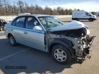 2003 Hyundai Accent GL with VIN KMHCG45C23U428132, listed as a Copart auction lot 45493875 with 0 mi miles and Salvage Title. Bid and sale history available at carsss.com. Image 4.