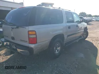 2004 Chevrolet Suburban LT with VIN 1GNEC16T84R125633, listed as a IAAI auction lot 42564242 with 328,946 mi miles and . Bid and sale history available at DreamBid. Image 4.