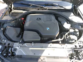 2024 BMW 3 Series 330i with VIN 3MW69FF04R8E27076, listed as a IAAI auction lot 41669381 with 12,057 mi miles. Bid and sale history available at carsss.com. Image 10.