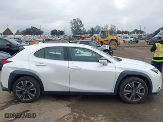 2022 Lexus UX with VIN JTHX3JBH2N2052061, listed as a IAAI auction lot 41878323 with 36,902 mi miles. Bid and sale history available at carsss.com. Image 13.