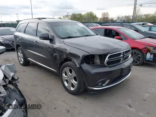 2014 Dodge Durango Limited z VIN 1C4RDJDG8EC597056, wystawiony jako IAAI lot #42116514 z przebiegiem 161 269 mil mil oraz . Historia ofert i sprzedaży dostępna na DreamBid. Obrazek 1.