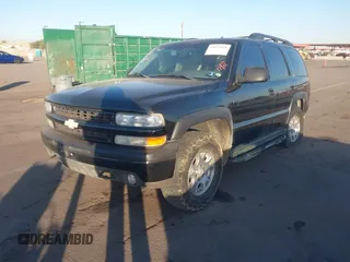 2002 Chevrolet Tahoe Z71 with VIN 1GNEK13T72R259229, listed as a IAAI auction lot 41074268 with 24,206 mi miles. Bid and sale history available at carsss.com. Image 2.
