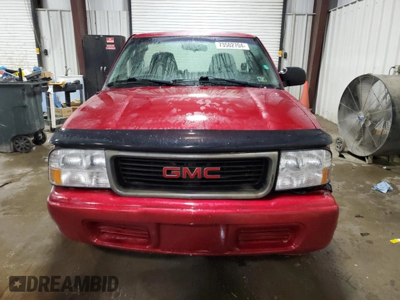 2003 GMC Sonoma SLS with VIN 1GTCS14H138149133, listed as a Copart auction lot 73502704 with 153,008 mi miles and Salvage Title. Bid and sale history available at DreamBid. Image 5.