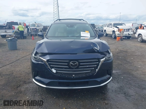 2020 Mazda CX-9 Grand Touring with VIN JM3TCBDY1L0402718, listed as a IAAI auction lot 42355511 with 87,205 mi miles and . Bid and sale history available at DreamBid. Image 12.