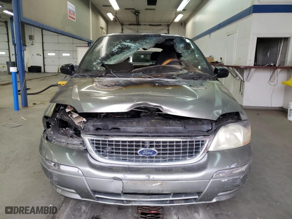 2003 Ford Windstar Wagon SE with VIN 2FMZA52403BB67426, listed as a Copart auction lot 77018904 with 0 mi miles and Salvage Title. Bid and sale history available at carsss.com. Image 5.