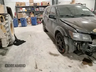 2014 Dodge Journey R/T z VIN 3C4PDCEG1ET167567, wystawiony jako Copart lot #45019695 z przebiegiem 133 095 mil mil oraz Szkoda całkowita • Salvage title. Historia ofert i sprzedaży dostępna na DreamBid. Obrazek 12.
