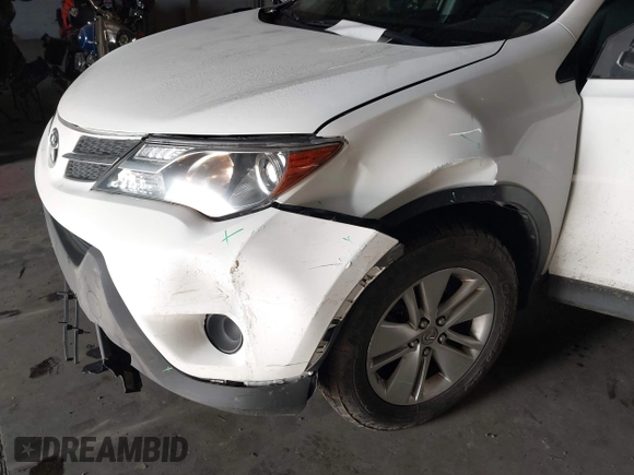 2014 Toyota RAV4 LE with VIN JTMBFREV8EJ005559, listed as a IAAI auction lot 41963080 with 126,296 mi miles and . Bid and sale history available at DreamBid. Image 17.