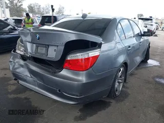 2010 BMW 5 Series 528i with VIN WBANU5C56AC127797, listed as a IAAI auction lot 42128290 with 137,578 mi miles and . Bid and sale history available at carsss.com. Image 4.