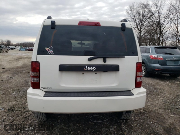 2010 Jeep Liberty Sport with VIN 1J4PP2GK9AW133958, listed as a Copart auction lot 47265675 with 124,466 mi miles and Salvage Title. Bid and sale history available at DreamBid. Image 6.