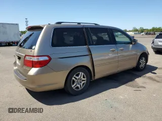 2005 Honda Odyssey EX-L with VIN 5FNRL38735B040552, listed as a Copart auction lot 57435355 with 183,768 mi miles and Salvage title. Bid and sale history available at DreamBid. Image 3.