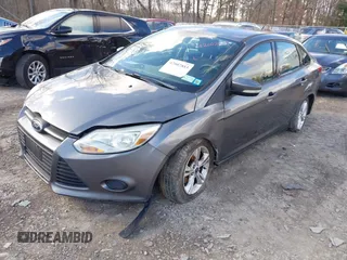 2014 Ford Focus SE with VIN 1FADP3F28EL424707, listed as a IAAI auction lot 42002883 with 115,746 mi miles. Bid and sale history available at carsss.com. Image 2.