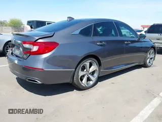 2019 Honda Accord Touring with VIN 1HGCV2F92KA004825, listed as a IAAI auction lot 41974555 with 74,464 mi miles and . Bid and sale history available at DreamBid. Image 4.