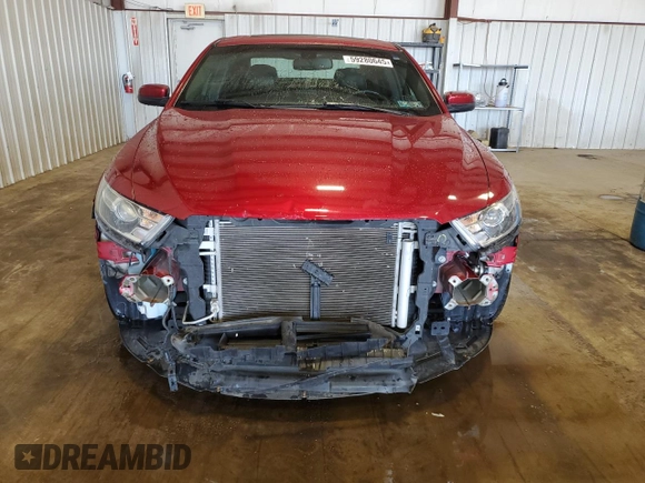 2015 Ford Taurus SEL with VIN 1FAHP2E83FG143653, listed as a Copart auction lot 59280645 with 77,048 mi miles and Salvage title. Bid and sale history available at DreamBid. Image 5.