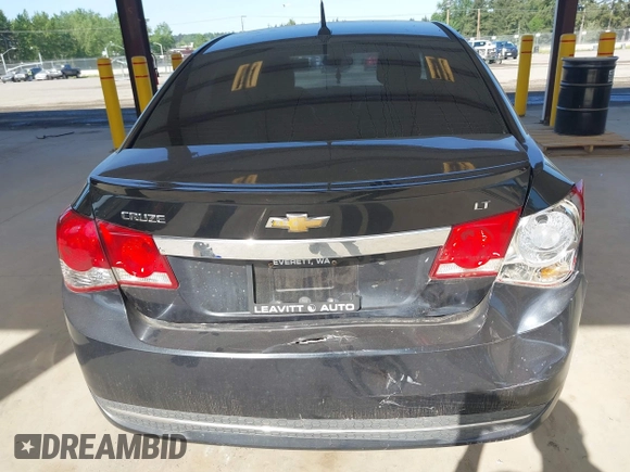 2014 Chevrolet Cruze 2LT z VIN 1G1PE5SB6E7260163, wystawiony jako IAAI lot #42182669 z przebiegiem 154 429 mil mil oraz . Historia ofert i sprzedaży dostępna na DreamBid. Obrazek 6.