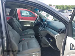 2008 Honda Odyssey EX-L z VIN 5FNRL38798B103173, wystawiony jako IAAI lot #42186360 z przebiegiem 207 341 mil mil oraz . Historia ofert i sprzedaży dostępna na DreamBid. Obrazek 5.