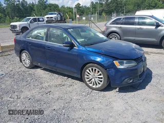 2014 Volkswagen Jetta TDI w/Premium/Nav with VIN 3VWLL7AJ3EM381929, listed as a IAAI auction lot 42539178 with 101,851 mi miles and . Bid and sale history available at DreamBid. Image 1.