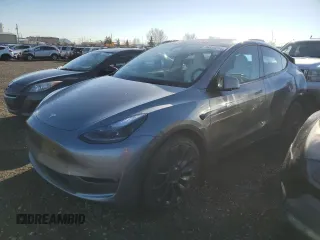 2024 Tesla Model Y Performance z VIN 7SAYGDEF7RF128238, wystawiony jako Copart lot #76629014 z przebiegiem Nie podano mil oraz Szkoda całkowita • Salvage title. Historia ofert i sprzedaży dostępna na DreamBid. Obrazek 1.