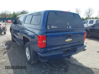 2017 Chevrolet Silverado 1500 LT with VIN 3GCUKREC5HG363503, listed as a IAAI auction lot 41833304 with 133,130 mi miles and . Bid and sale history available at DreamBid. Image 3.