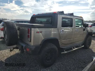 2005 Hummer H2 SUT with VIN 5GRGN22U85H110412, listed as a Copart auction lot 73856704 with 262,954 mi miles and Salvage Title. Bid and sale history available at carsss.com. Image 3.