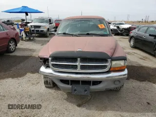 2001 Dodge Dakota Sport z VIN 1B7GG22N81S152399, wystawiony jako Copart lot #58543135 z przebiegiem 218 133 mil mil oraz Szkoda całkowita • Salvage title. Historia ofert i sprzedaży dostępna na DreamBid. Obrazek 5.