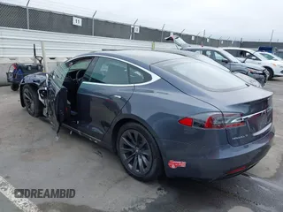 2017 Tesla Model S 100D with VIN 5YJSA1E20HF228681, listed as a IAAI auction lot 42424793 with Not provided miles and . Bid and sale history available at DreamBid. Image 3.