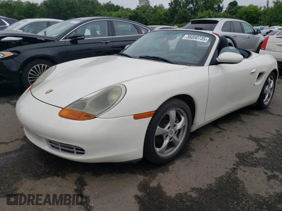 2001 Porsche Boxster z VIN WP0CA29821U622592, wystawiony jako Copart lot #56050735 z przebiegiem Nie podano mil oraz Szkoda całkowita • Salvage title. Historia ofert i sprzedaży dostępna na DreamBid. Obrazek 1.