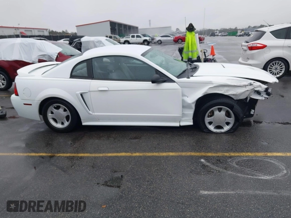 1999 Ford Mustang z VIN 1FAFP4049XF152937, wystawiony jako IAAI lot #41570514 z przebiegiem 185 382 mil mil oraz . Historia ofert i sprzedaży dostępna na DreamBid. Obrazek 14.