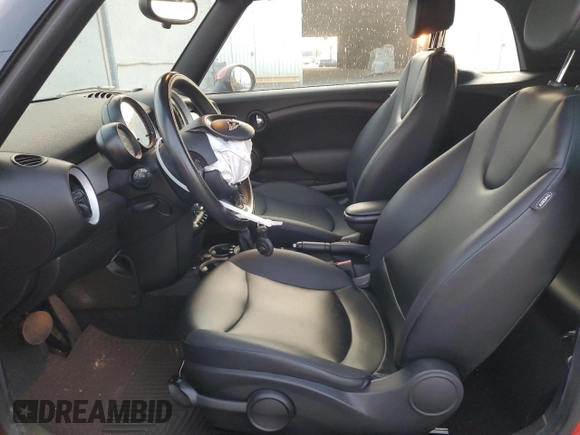 2015 MINI Convertible with VIN WMWZN3C59FT862963, listed as a Copart auction lot 86016514 with 96,493 mi miles and Salvage title. Bid and sale history available at DreamBid. Image 7.