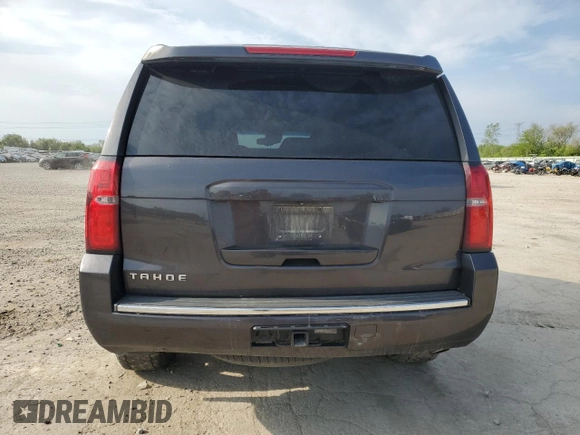 2015 Chevrolet Tahoe LTZ z VIN 1GNSKCKC4FR626030, wystawiony jako Copart lot #56280805 z przebiegiem Nie podano mil oraz Szkoda całkowita • Salvage title. Historia ofert i sprzedaży dostępna na DreamBid. Obrazek 6.