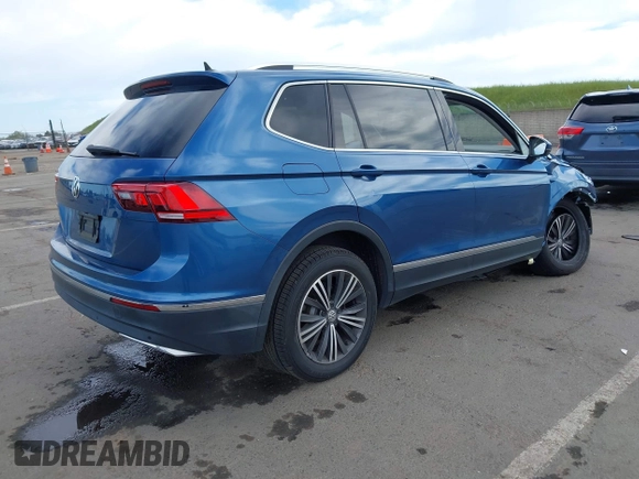 2019 Volkswagen Tiguan SE with VIN 3VV3B7AX2KM064568, listed as a IAAI auction lot 42008754 with 53,132 mi miles and . Bid and sale history available at DreamBid. Image 4.