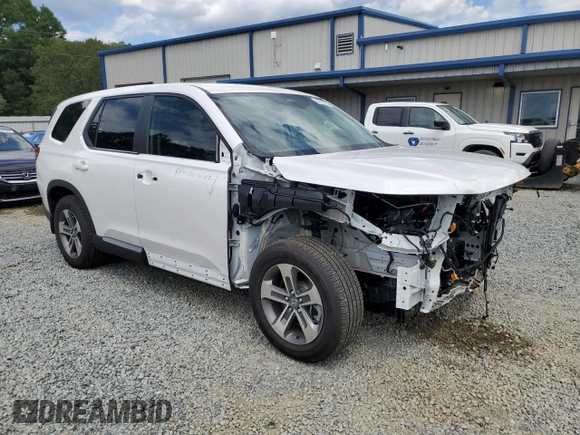 2025 Honda Pilot EX-L with VIN 5FNYG2H40SB005656, listed as a Copart auction lot 67875224 with 7,080 mi miles and Salvage Title. Bid and sale history available at carsss.com. Image 4.