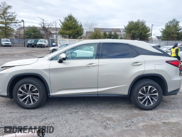 2021 Lexus RX with VIN 2T2HZMDA4MC260038, listed as a IAAI auction lot 41737513 with 45,252 mi miles. Bid and sale history available at carsss.com. Image 14.