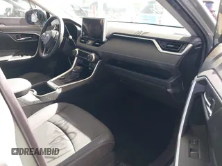 2023 Toyota RAV4 Hybrid XLE Premium with VIN JTMB6RFV8PD086983, listed as a IAAI auction lot 41612674 with 70,817 mi miles. Bid and sale history available at carsss.com. Image 5.