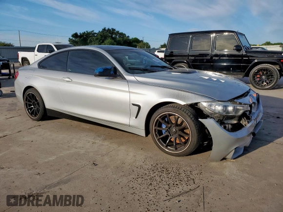 2015 BMW 4 Series 428i z VIN WBA3N3C55FK231929, wystawiony jako Copart lot #57683365 z przebiegiem 169 527 mil mil oraz Szkoda całkowita • Salvage title. Historia ofert i sprzedaży dostępna na DreamBid. Obrazek 4.