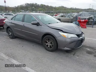 2015 Toyota Camry XLE with VIN 4T4BF1FK5FR483736, listed as a IAAI auction lot 41933106 with 104,468 mi miles. Bid and sale history available at carsss.com. Image 1.