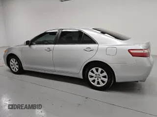2009 Toyota Camry LE z VIN 4T1BK46K89U595880, wystawiony jako Copart lot #55069935 z przebiegiem 265 831 mil mil oraz Czysty tytuł • Clean title. Historia ofert i sprzedaży dostępna na DreamBid. Obrazek 2.