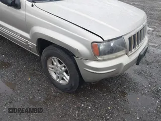 2004 Jeep Grand Cherokee Laredo with VIN 1J4GW48N24C230058, listed as a IAAI auction lot 42386914 with Not provided miles and . Bid and sale history available at DreamBid. Image 6.