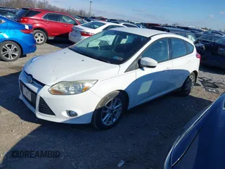 2012 Ford Focus SE z VIN 1FAHP3K29CL265135, wystawiony jako IAAI lot #40989480 z przebiegiem 158 742 mil mil oraz . Historia ofert i sprzedaży dostępna na DreamBid. Obrazek 17.