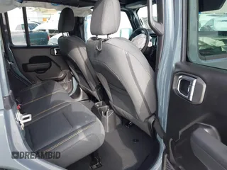 2024 Jeep Wrangler Sport S with VIN 1C4PJXDN2RW306332, listed as a IAAI auction lot 41036573 with 1,785 mi miles and . Bid and sale history available at DreamBid. Image 8.