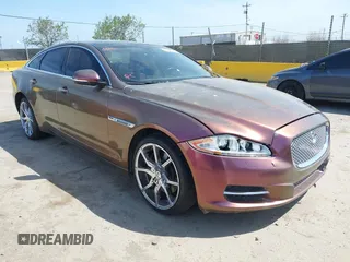 2011 Jaguar XJ with VIN SAJWA1CBXBLV09848, listed as a IAAI auction lot 42053920 with 121,769 mi miles and . Bid and sale history available at DreamBid. Image 1.