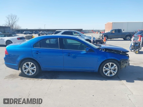 2012 Ford Fusion SE z VIN 3FAHP0HA9CR395009, wystawiony jako IAAI lot #41855650 z przebiegiem 178 901 mil mil oraz . Historia ofert i sprzedaży dostępna na DreamBid. Obrazek 14.