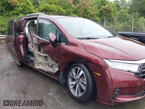 2021 Honda Odyssey Touring with VIN 5FNRL6H88MB006938, listed as a IAAI auction lot 42367022 with 63,280 mi miles and . Bid and sale history available at DreamBid. Image 6.