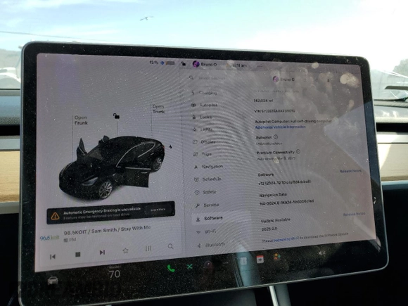 2019 Tesla Model 3 Mid Range with VIN 5YJ3E1EAXKF311719, listed as a Copart auction lot 44570825 with 143,034 mi miles and Salvage Title. Bid and sale history available at carsss.com. Image 9.