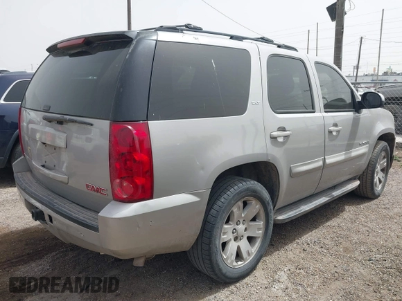 2007 GMC Yukon SLT with VIN 1GKFK13007J115065, listed as a IAAI auction lot 41837778 with 234,917 mi miles. Bid and sale history available at carsss.com. Image 4.