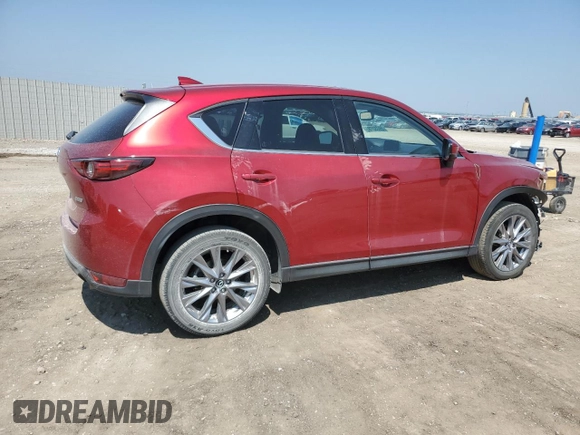 2019 Mazda CX-5 Grand Touring with VIN JM3KFBDM7K1668396, listed as a Copart auction lot 59732785 with 23,855 mi miles and Salvage title. Bid and sale history available at DreamBid. Image 3.