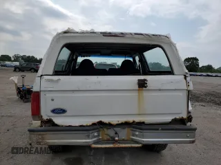 1996 Ford Bronco XL z VIN 1FMEU15N7TLB20204, wystawiony jako Copart lot #58887615 z przebiegiem 214 944 mil mil oraz Czysty tytuł • Clean title. Historia ofert i sprzedaży dostępna na DreamBid. Obrazek 6.