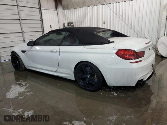 2016 BMW M6 z VIN WBS6G9C58GD932069, wystawiony jako Copart lot #55722063 z przebiegiem 61 793 mil mil oraz . Historia ofert i sprzedaży dostępna na DreamBid. Obrazek 2.